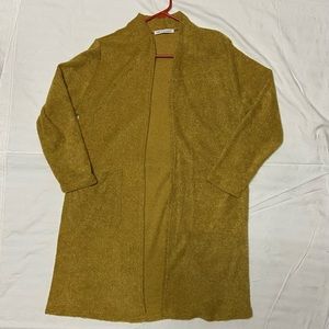 Chris and Carol mustard cardigan